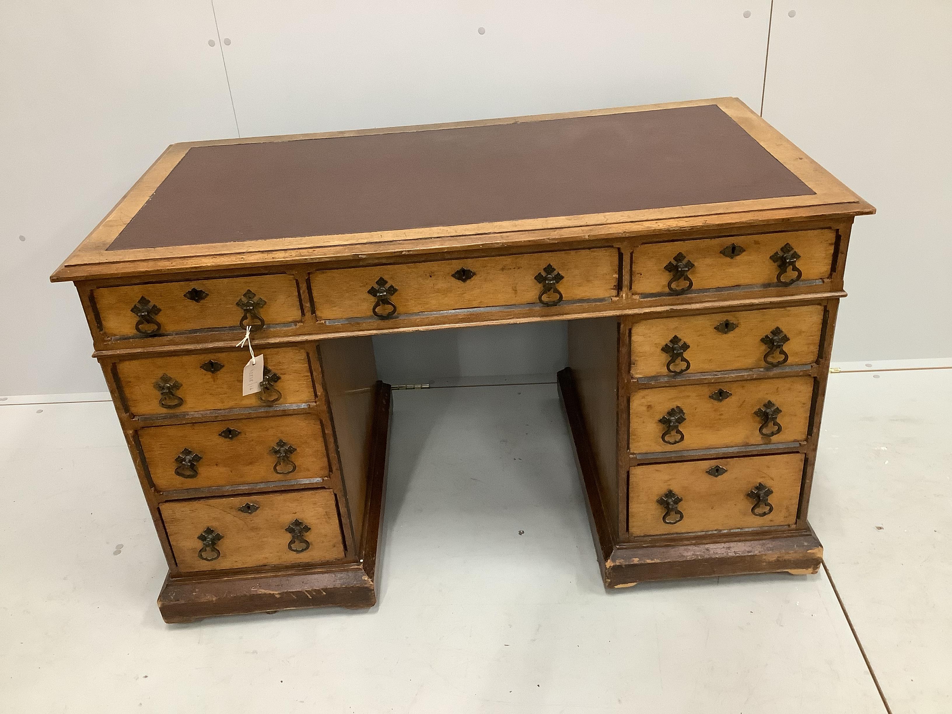 A late Victorian Aesthetic movement oak pedestal desk, width 122cm, depth 67cm, height 76cm